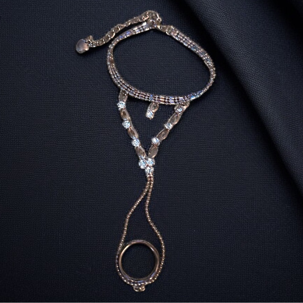 Gold tone rhinestone slave bracelet